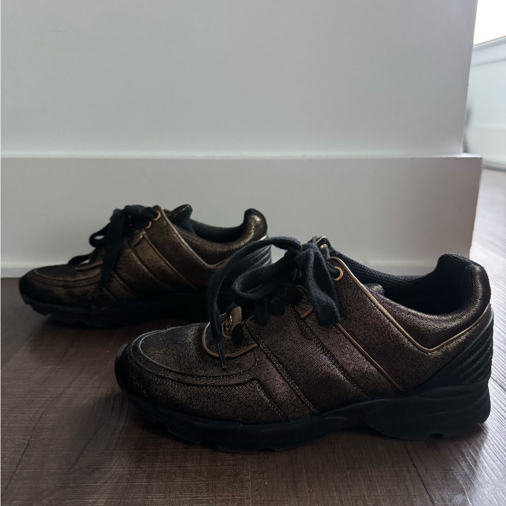 CHANEL Black and Gold Sneakers